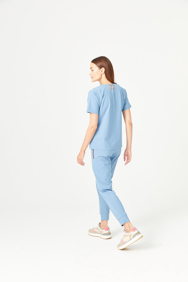 01 Kadın Sıfır Yaka Patlı Scrub Üst - Kozmik Mavi
